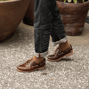 Heritage Crew Socks worn with brown shoes, showcasing stylish casual attire outdoors.