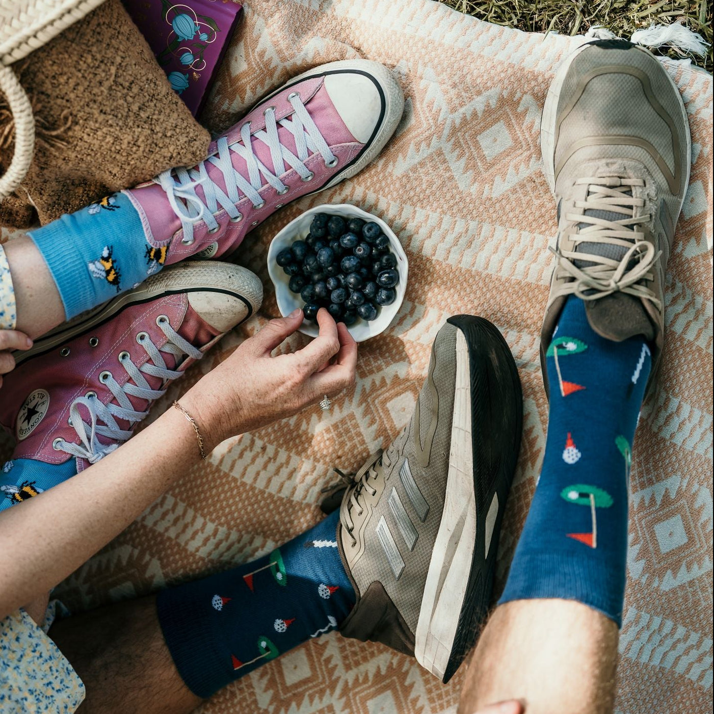 Golf Crew Socks. Cotton novelty socks with golf clubs and ball pattern in blue and green