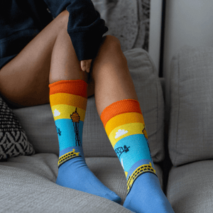 lady wearing lafitte iconic sydney crew socks with sydney scenery.