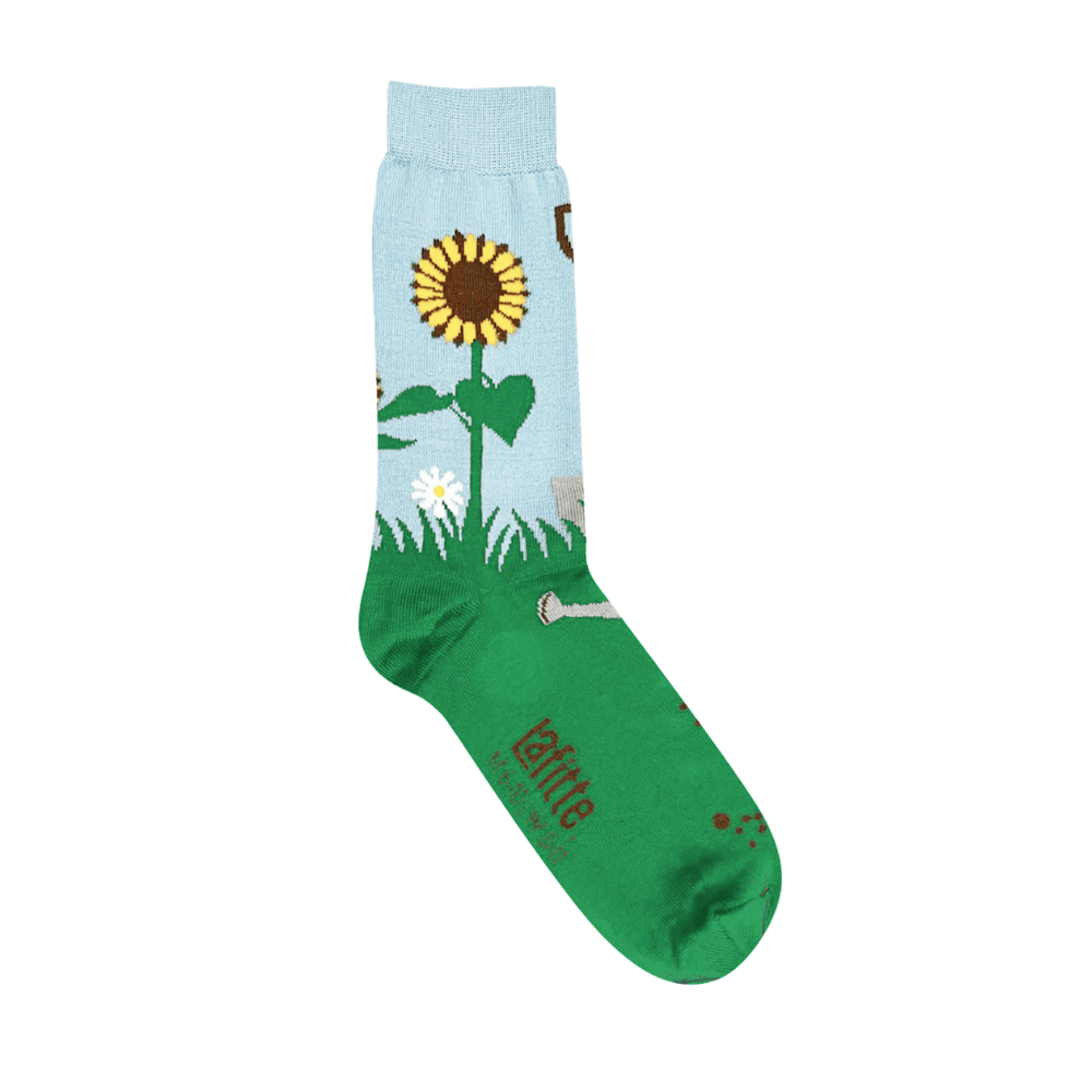 Sunflower Crew Socks design featuring a bright sunflower and green grass motif, made from soft cotton, Australian made.