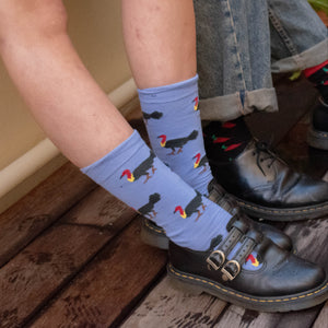 Person wearing Brush Turkey Crew Socks in blue cotton