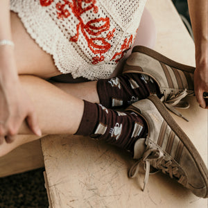 Person wearing Coffee Crew Socks in brown, white and beige cotton