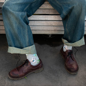 man wearing kookaburra crew socks in a marle grey cotton